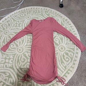 Size small pink Steve Madden long sleeve body con mini dress with ruching on bot
